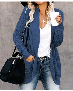 Cozy blue knitted cardigan with curved hem and pockets for women's autumn style