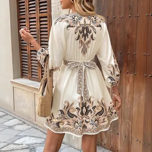 Bohemian style cream short dress with elegant paisley print and waist tie for summer fashion