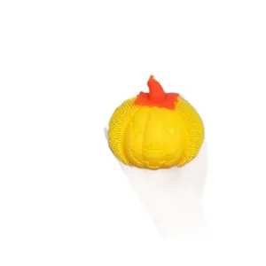 Yellow Halloween pumpkin squishy stress toy with tactile bristles for kids and adults