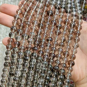 High-quality close-up of translucent brown phantom glass beads for DIY jewelry crafts