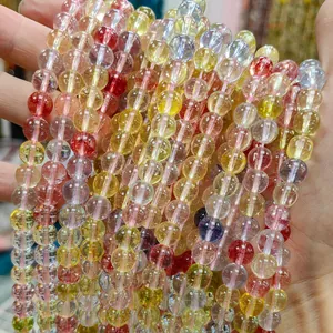 Macro close-up of colorful phantom glass crystal round beads for DIY jewelry making