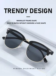 Close-up of trendy black and gold Clubmaster sunglasses with minimalist frame design