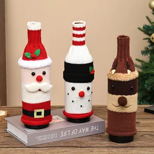 Set di 3 copribottiglie di vino natalizi lavorati a maglia con Babbo Natale e renne