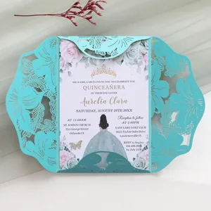 Detailed view of an elegant turquoise laser-cut Quinceañera invitation with floral patterns