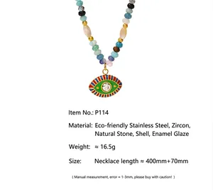 Detail view of a colorful evil eye pendant necklace with vibrant natural stone beads