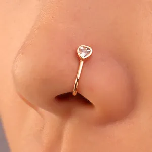 Elegant rose gold U-shaped nose clip featuring a sparkling heart-shaped zircon stone.