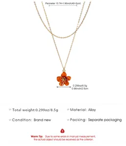 Detailed gold layered necklace with orange flower pendant and product specifications