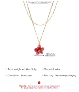 Specifications for gold-tone double-layered necklace featuring pink flower pendant