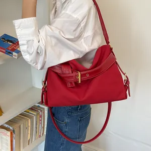 Stylish minimalist red shoulder bag, casual women's crossbody bag for spring 2026.
