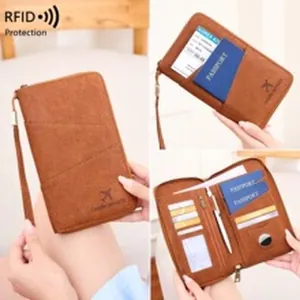 Detailed macro view of brown RFID leather wallet showing passport and credit card slots