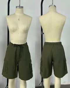 Detailed studio view of army green cargo shorts showing front and back on mannequins.