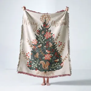 Detailed texture of woven Christmas tree tapestry blanket with festive holiday squirrel patterns