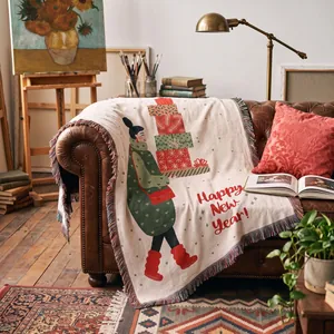 Cozy bohemian woven throw blanket with New Year illustration on a leather sofa