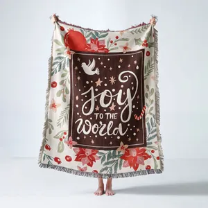 Festive Joy to the World woven Christmas throw blanket featuring floral motifs and fringe