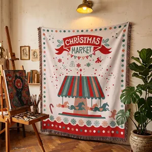 Woven Christmas Market tapestry with carousel design hanging in a cozy artist studio
