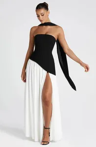 Elegant black and white strapless maxi dress with high side slit for formal events