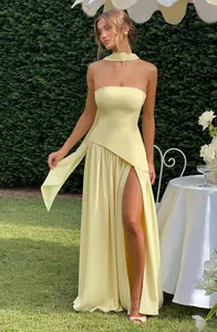 Elegant pale yellow strapless maxi dress featuring a sexy high thigh slit and matching neck scarf