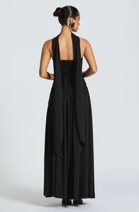 Rear view of elegant black backless maxi dress with lace-up corset and long neck ties