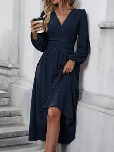 Elegant navy blue V-neck long sleeve dress with lantern sleeves and pleated waist.