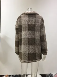 Back view of a brown and tan plaid sherpa fleece jacket for women on a mannequin