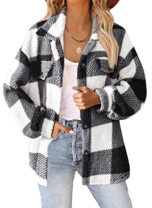 Detailed view of the soft plaid fleece fabric and button down closure on a women's jacket