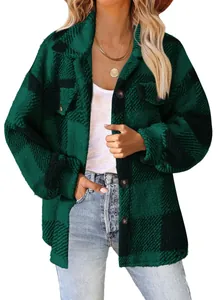 Detail showing green plaid sherpa texture and button closure on women's jacket