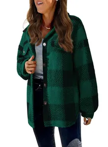 Detailed view of women's green and black plaid sherpa jacket featuring button-down front