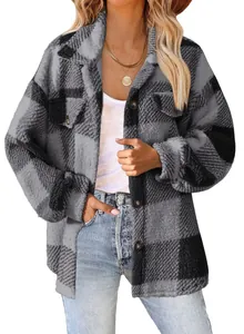 Detailed view of grey plaid sherpa fleece jacket featuring buttons and chest pockets