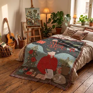 Artistic New Year woven throw blanket with tassels shown in a cozy bedroom scene