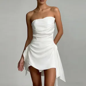 Elegant white strapless mini dress with pleated details and irregular hemline design