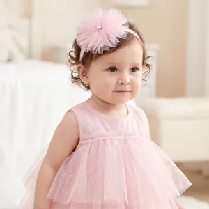Sweet pink tulle flower headband with rhinestone detail for baby girls' special occasions