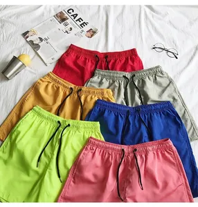 Detailed display of colorful candy-colored quick-dry casual beach shorts with black drawstrings