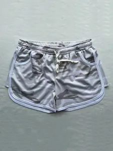 Breathable camouflage athletic shorts with white drawstring and contrast piping detail