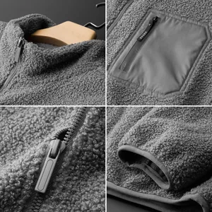 Gray Sherpa fleece jacket featuring textured fabric and functional zipper details