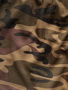 Close-up macro detail showing camouflage mesh fabric texture for breathable sports shorts