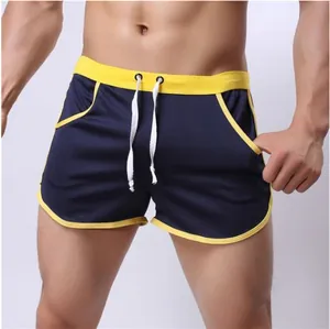 Men's breathable navy blue mesh sports shorts with yellow trim and adjustable drawstring