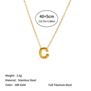 Close-up of golden 'C' initial necklace made of 18K gold plated stainless steel