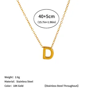 Detail of 18K gold plated stainless steel necklace featuring a minimalist letter D pendant.