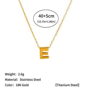 18K gold plated stainless steel necklace with 'E' initial pendant and specs