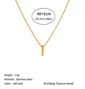 Detail view of a minimalist 18K gold-plated stainless steel vertical bar pendant necklace