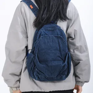 Mochila pequeña de mezclilla lavada vintage para mujer con diseño casual azul oscuro