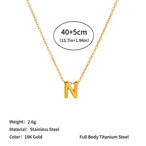 Detail of gold 18k stainless steel necklace with 'N' initial pendant and size specs