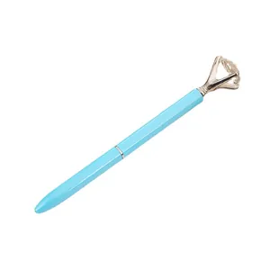Elegante bolígrafo de metal azul Tiffany con un gran cristal transparente en forma de diamante