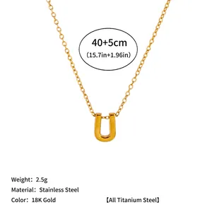 Macro detail showing 18K gold finish and chain specs for U-letter pendant necklace