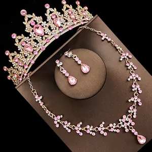 Elegant 3-piece bridal jewelry set with pink crystals and crown