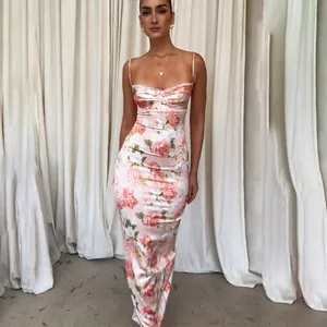 Elegantly fitted French style floral satin slip dress featuring a fishtail maxi skirt