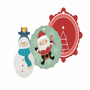 Detail of ceramic Christmas ornaments featuring Santa Claus, a snowman, and festive designs.