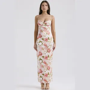 Front view of an elegant pink floral satin slip dress with a French fishtail maxi silhouette