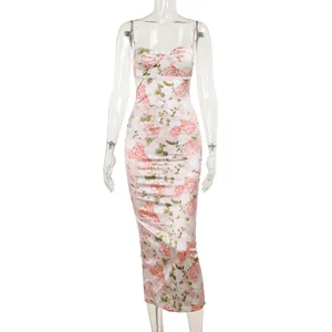Detailed view of a French style floral satin spaghetti strap dress with slim mermaid silhouette