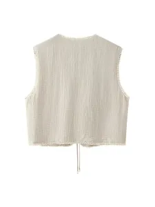 Back view of vintage crinkled sleeveless vest featuring lace trim and drawstring hem